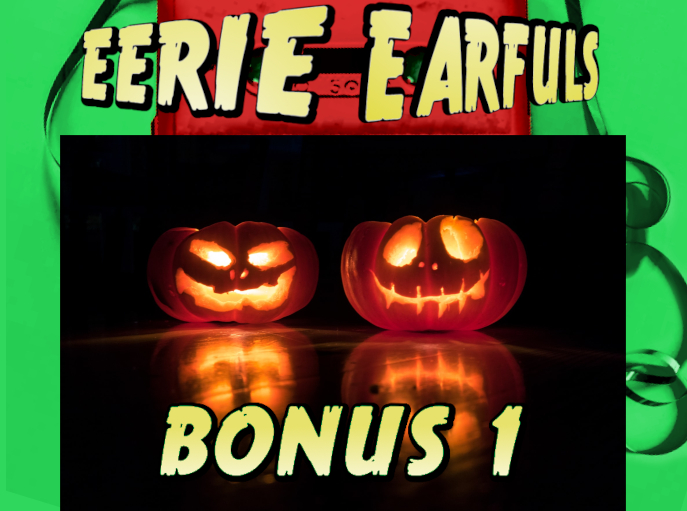 Two jack o lanterns illuminated in a pitch black room.